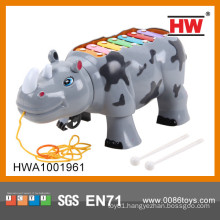 Lovely cartoon plastic rhinoceros with light & music xylophone musical instruments prices